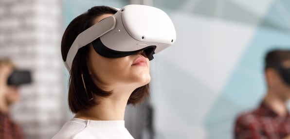 A woman in a white VR headset