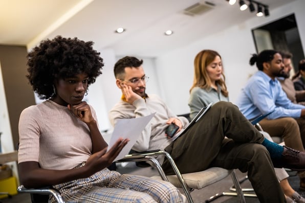 Group of multiethnic business people waiting for job interview.