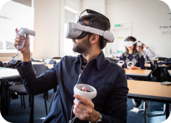 Copy of ESCP Staff Member wearing headset 3