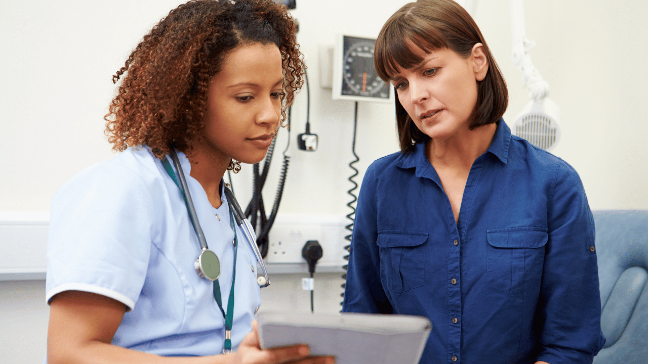 Female nurse with female patient