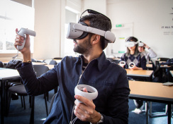 Copy of ESCP Staff Member wearing headset 3