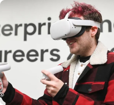 Man with red hair and a red jacket using VR